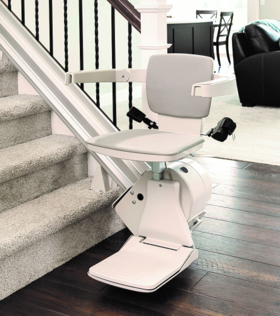 Bruno Elan straight stair lift on a wooden staircase